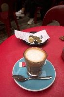 Coffee in Annecy, France, Annecy, europe, france, haute-savoie, café, coffee, bill, payment, euros, coins, table, red, foam, glass, saucer