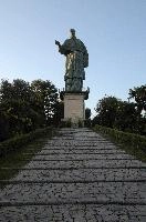 Colossus of Saint Charles Borromeo, a monumental statue at Arona in Piemonte, bronze, carol, colossus, charles, outdoors, figure, sunlight, religious, maggiore, catholic, lake, tourist attraction, piemonte, icon, arona, sculpture, italy, saint, europe, statue, borromeo