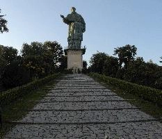 Colossus of Saint Charles Borromeo, a monumental statue at Arona in Piemonte, bronze, carol, colossus, charles, outdoors, figure, sunlight, religious, maggiore, catholic, lake, tourist attraction, piemonte, icon, arona, sculpture, italy, saint, europe, statue, borromeo