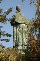 Colossus of Saint Charles Borromeo, a monumental statue at Arona in Piemonte, bronze, carol, colossus, charles, outdoors, figure, sunlight, religious, maggiore, catholic, lake, tourist attraction, piemonte, icon, arona, sculpture, italy, saint, europe, statue, borromeo