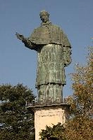 Colossus of Saint Charles Borromeo, a monumental statue at Arona in Piemonte, bronze, carol, colossus, charles, outdoors, figure, sunlight, religious, maggiore, catholic, lake, tourist attraction, piemonte, icon, arona, sculpture, italy, saint, europe, statue, borromeo