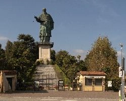 Colossus of Saint Charles Borromeo, a monumental statue at Arona in Piemonte, bronze, carol, colossus, charles, outdoors, figure, sunlight, religious, maggiore, catholic, lake, tourist attraction, piemonte, icon, arona, sculpture, italy, saint, europe, statue, borromeo