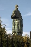 Colossus of Saint Charles Borromeo, a monumental statue at Arona in Piemonte, bronze, carol, colossus, charles, outdoors, figure, sunlight, religious, maggiore, catholic, lake, tourist attraction, piemonte, icon, arona, sculpture, italy, saint, europe, statue, borromeo