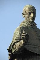 Colossus of Saint Charles Borromeo, a monumental statue at Arona in Piemonte, bronze, carol, colossus, charles, outdoors, figure, sunlight, religious, maggiore, catholic, lake, tourist attraction, piemonte, icon, arona, sculpture, italy, saint, europe, statue, borromeo