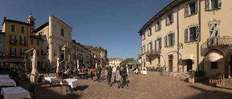 Buildings around the main square in Arona, Piemonte, restaurant, café, maggiore, lago, square, summer, town, outdoors, arona, people, piemonte, blue sky, italy, sunlight, europe, tourism