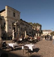 Buildings around the main square in Arona, Piemonte, restaurant, café, maggiore, lago, square, summer, town, outdoors, arona, people, piemonte, blue sky, italy, sunlight, europe, tourism