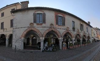Buildings around the main square in Arona, Piemonte, restaurant, café, maggiore, lago, square, summer, town, outdoors, arona, people, piemonte, blue sky, italy, sunlight, europe, tourism