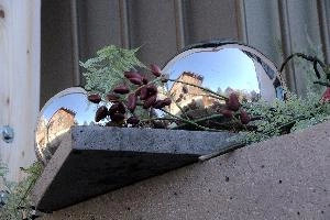 Christmas decorations in Bad Ragaz, Switzerland, badragaz, walenstadt, wall, shiny, globe, reflection, decorations, switzerland, exterior, europe, christmas, house, berries, mirror, domestic, home