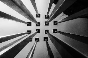 Converging lines of artwork seen against the sky; 2018 quadrennial of Bad Ragartz art festival in Switzerland, artwork, abstract, art, lines, ragartz, converging, ragaz, skyward, bad, perspective, grisons, vanishing point, graubünden, towers, sky, posts, swiss, poles, switzerland, sculpture, wooden,  2018 quadrennial of bad ragartz art festival in switzerland