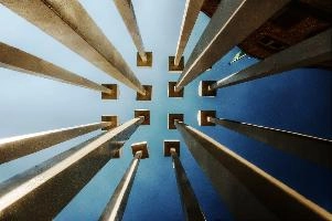 Converging lines of artwork seen against the sky; 2018 quadrennial of Bad Ragartz art festival in Switzerland, artwork, abstract, art, lines, ragartz, converging, ragaz, skyward, bad, perspective, grisons, vanishing point, graubünden, towers, sky, posts, swiss, poles, switzerland, sculpture, wooden,  2018 quadrennial of bad ragartz art festival in switzerland