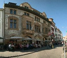 Street scene on Barfüsserplatz in Basel, street, fresco, city, urban, square, switzerland, barfuesserplatz, decoration, basel, outdoor, swiss, painted, summer, café, ornate, europe, tables, plaster, facade, sunshine