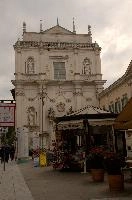 Church and newspaper stand in Brescia, Lombardy, brescia