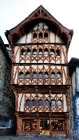 Half-timbered building frontage in Guingamp, Brittany, half-timbered, old, wood, quaint, bretagne, traditional, building, overhang, urban, windows, architecture, narrow, granite, gable, stone, french, brittany, breton, france, tiered