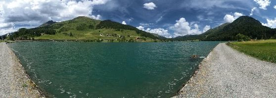 Davosersee in Graubünden, alps, grisons, europe, switzerland, famous, davosersee, tourism, lake, artificial, davos, summer, mountains, recreation, bank, boating, sky, scenery, graubünden, swiss, village, concrete, clouds, blue