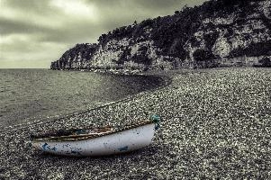 Beached boat at Beer, Devon, null