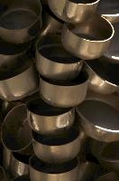 Artwork made of steel pots and pans in Lostallo, Switzerland, stack, steel, metal, pans, sculpture. pots, art, grisons, lostallo, switzerland, cascade, europe, pile