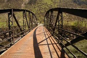 Iron pedestrian bridge across the Ticino river in Switzerland, metal, steel, iron, pedestrian, bridge, river, ticino, italian, switzerland, europe