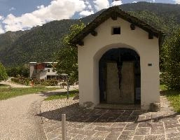 Chapel in Lostallo, Grisons in Switzerland, sunlight, summer, religion, christian, building, outdoors, swizterland, europe, grisons, chapel, doorway, church, arch