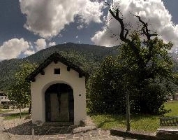 Chapel in Lostallo, Grisons in Switzerland, sunlight, summer, religion, christian, building, outdoors, swizterland, europe, grisons, chapel, doorway, church, arch
