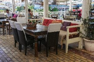Bar scene in Chania, Crete, restaurant, summer, bar, airy, island, open, europe, interior, autumn, white, tourism, wooden, outdoor, chairs, mediterranean, seating, crete, terrace, greece, catering, holiday
