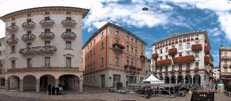 Concert in Lugano, outdoors, daytime, urban, blue sky, tessin, truck, lugano, stage, piazza, ornate, swiss, sunlilght, city, clouds, switzerland, building, italianate, square, grand, buildings, tourism, flowers, preparation, italian, town, lorry, ticino, concert, old, summer, geraniums