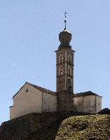 Chapel with onion tower in Swiss town of Mesocco, catholic, blue, sky, building, chapel, church, onion, italian, clock, mesocco, tower, grisons, facade, switzerland, exterior, europe, religion