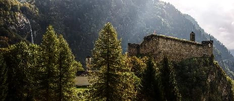 The Castello di Mesocco in the Grisons, Swiss Alps, scenery, summer, historic, view, beautiful, edifice, castle, dramatic, stone, castello, clouds, south, mesocco, haze, route, grisons, rays, church, old, graubünden, sunlight, village, ruin, europe, valley, mist, alpine, swiss, italian, light, mountains, switzerland, scenic, evening, alps