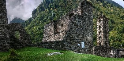 Bell tower of the Castello di Mesocco in Grisons, Switzerland, stone, heritage, italianate, historic, castle, wreck, church, ruin, graubünden, overcast, grisons, cloudy, mesocco, christianity, europe, religion, site, swiss, windows, significance, switzerland, tower, national