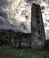 Bell tower of the Castello di Mesocco in Grisons, Switzerland, stone, heritage, italianate, historic, castle, wreck, church, ruin, graubünden, overcast, grisons, cloudy, mesocco, christianity, europe, religion, site, swiss, windows, significance, switzerland, tower, national