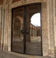 Doors in Milano, italy, wooden, reflection, portal, basilica, doors, milan, carved, europe, santambrogio, architecture, courtyard, ornate, glass, facade, building