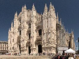 Milan cathedral from the square seen in bright sunglight, italy, catholicism, sunshine, church, white, cathedral, milan, historic, europe, duomo, monumental, religion, summer, stone, architecture