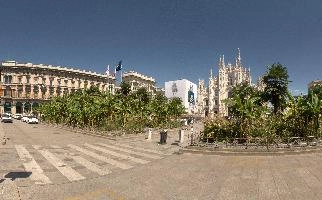 Milan cathedral from the square seen in bright sunglight, italy, catholicism, sunshine, church, white, cathedral, milan, historic, europe, palms, duomo, monumental, religion, summer, stone, architecture