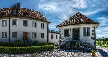 Buildings in the monastery area around Pfäffikon, Lake Zürich, traditional, preserved, old, tourism, buildings, townscape, lake, rural, daytime, zürchersee, village, bright, zuerich, construction, blue sky, zürich, stone, sunlight, pfäffikon, terracotta, sunny, swiss, lakeside, autumn, switzerland, monastery, outdoors