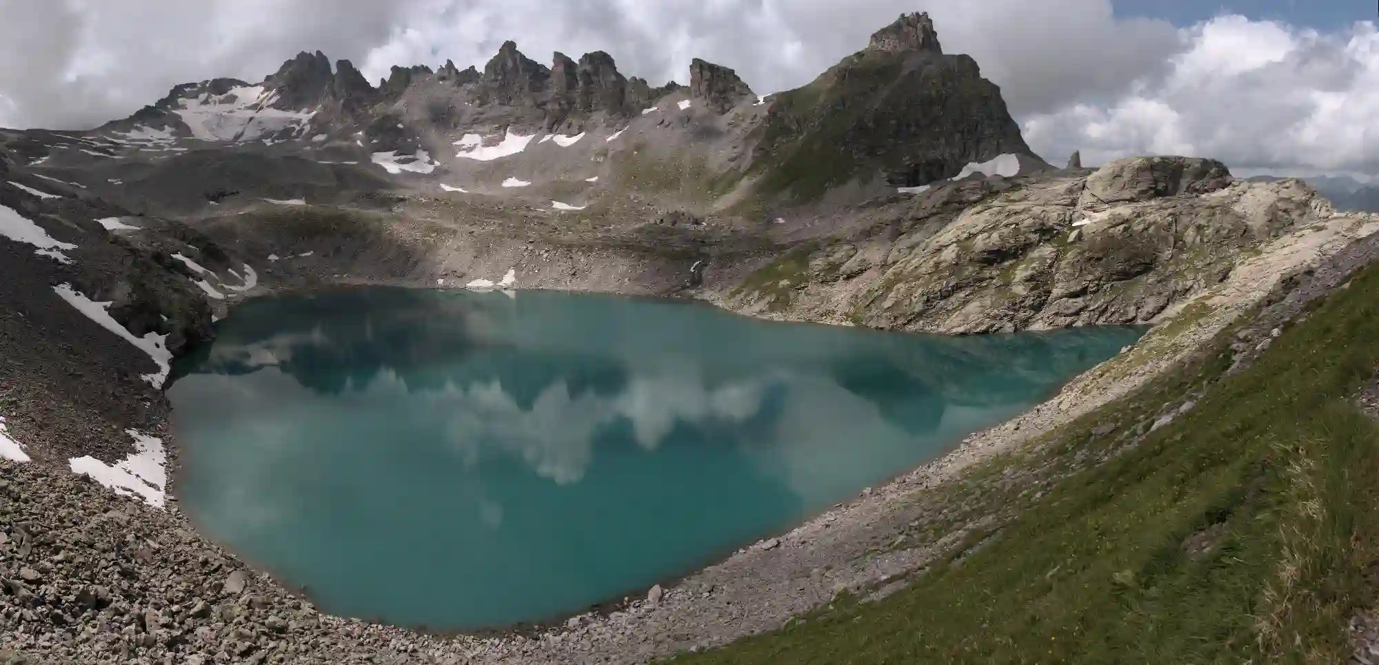 Teal waters of the Wildsee on the Pizol 5-lakes walk, turquoise, wildsee, wild, lake, glacial, pizol, water, sargans, hiking, mountains, walking, alps, outdoors, switzerland, summer, europe, teal