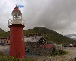 Landlocked Lighthouse on the road to the Furkapass, lighthouse, grisons, tomasee, andermatt, sky, moody, stormy, landcocked, cloud, isolated, europe, red, switzerland, tower