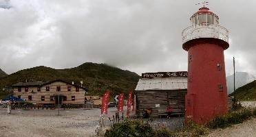 Landlocked Lighthouse on the road to the Furkapass, lighthouse, grisons, tomasee, andermatt, sky, moody, stormy, landcocked, cloud, isolated, europe, red, switzerland, tower
