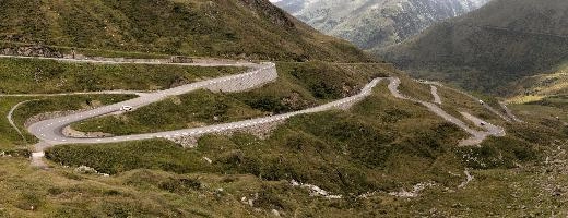 Serpentine road leading up to the Furka Pass in Grisons, Switzerland, bends, serpentine, route, road, furkapass, tomasee, andermatt, summer, grisons, green, switzerland, hillside, europe, winding