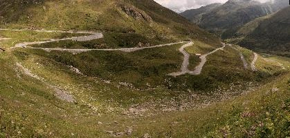 Serpentine road leading up to the Furka Pass in Grisons, Switzerland, bends, serpentine, route, road, furkapass, tomasee, andermatt, summer, grisons, green, switzerland, hillside, europe, winding