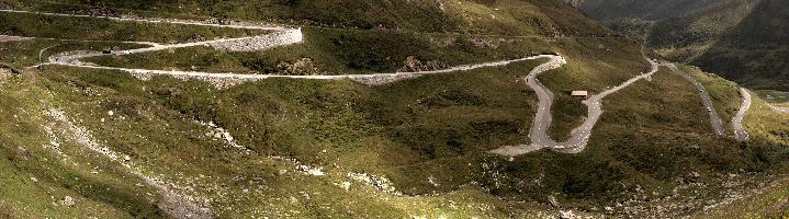 Serpentine road leading up to the Furka Pass in Grisons, Switzerland, bends, serpentine, route, road, furkapass, tomasee, andermatt, summer, grisons, green, switzerland, hillside, europe, winding