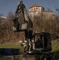 Digger in front of castle in Swiss Rhine gorge, mountains, alps, gorge, rhine, machine, digger, rhäzüns, grisons, switzerland, work, europe, excavation
