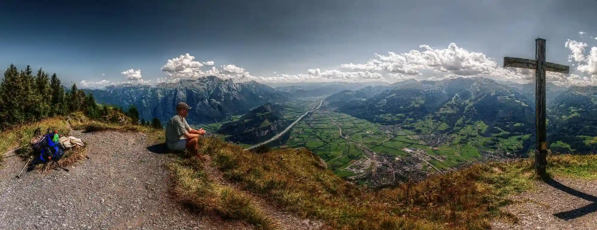 View into the alpine Rhine valley from the Gonzen, showing mountain man at rest, switzerland, sankt, gallen, sargans, gonzen, rhine, valley, view, panorama, simon, man, hoker, river, cross, peak