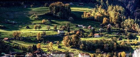 Evening light on the meadows of the Swiss Alps around Flums