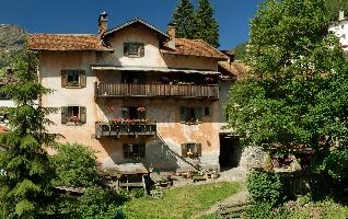 Spluegen, blue sky, spluegen, agricultural, switzerland, hiking, alpine, farming, geraniums, alps, building, balconies, sun, graubuenden, agriculture, swiss, walking, schweiz, mountain, summer, traditional, house, sunny, grisons, sunlight, rustic, tourism, blue sky, mountains, dairy, graubünden, village, rural, holiday, outdoors