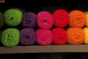 Hot Wool Colours, buchs, fibre, display, shelves, supply, balls, europe, fabric, switzerland, provisions, wool, natural, material, shop, knitting, colourful
