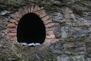 Wall with arched opening in Cabbio, Ticino, ticino