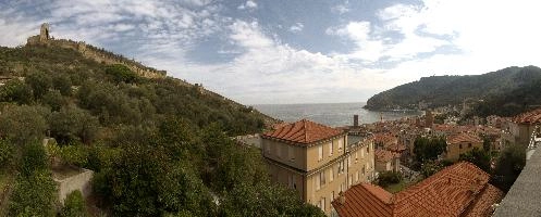 Noli in Liguria showing castle, mediterranean, facade, village, liguria, autumn, canto, sea, europe, exterior, coast, italy, sunlight, hill, torre, beach, tower, bay, tourism, resort, castle, mediaeval, noli, red, brick, rooves, terracotta