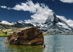 Matterhorn and Stellisee, valais, national, matterhorn, pyramidal, switzerland, lake, cervino, alps, lichen, wallis, border, mountains, iconic, schweiz, le cervin, famous, alpine, green, boulder, landscape, landmark, tourism, red, swiss, stellisee, rocks, mountain, daylight, spectacular