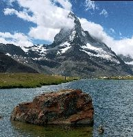 Matterhorn and Wannabe, stellisee, national, switzerland, pyramidal, lake, alps, cervino, alpine, lichen, wallis, border, swiss, iconic, schweiz, le cervin, famous, matterhorn, green, mountains, landscape, landmark, tourism, red, valais, boulder, rocks, mountain, daylight, spectacular