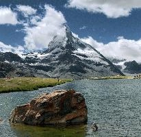 Matterhorn and Stellisee, stellisee, national, lake, pyramidal, switzerland, valais, cervino, alps, lichen, wallis, border, mountains, iconic, schweiz, le cervin, famous, matterhorn, green, boulder, landscape, landmark, tourism, red, swiss, alpine, rocks, mountain, daylight, spectacular