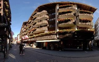 Geranium-infested street in Zermatt, alps, travel, hotel, town, zermatt, europe, tourism, switzerland, valais, building, street